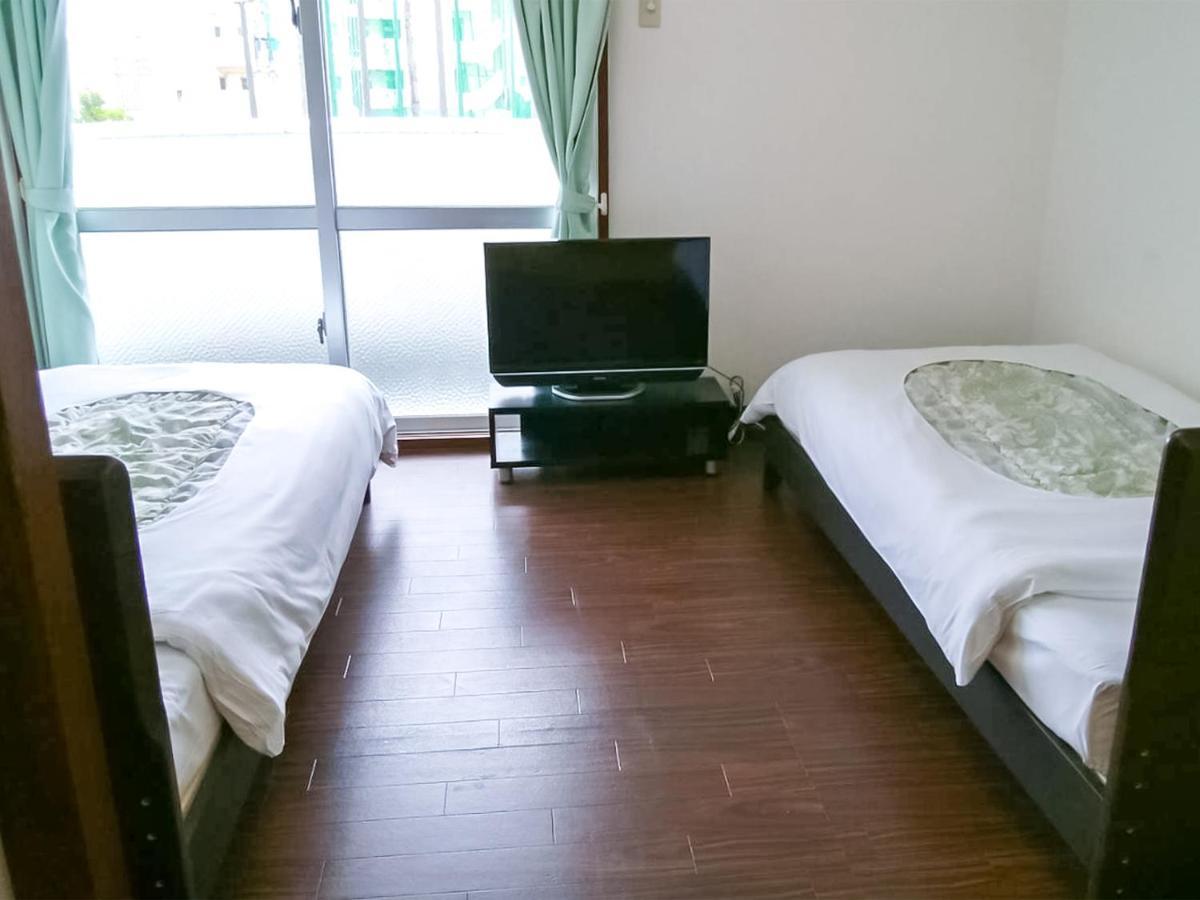 Sunset Hills Inn Naha Esterno foto