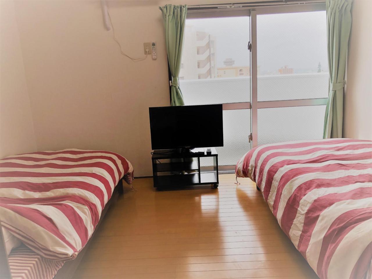 Sunset Hills Inn Naha Esterno foto